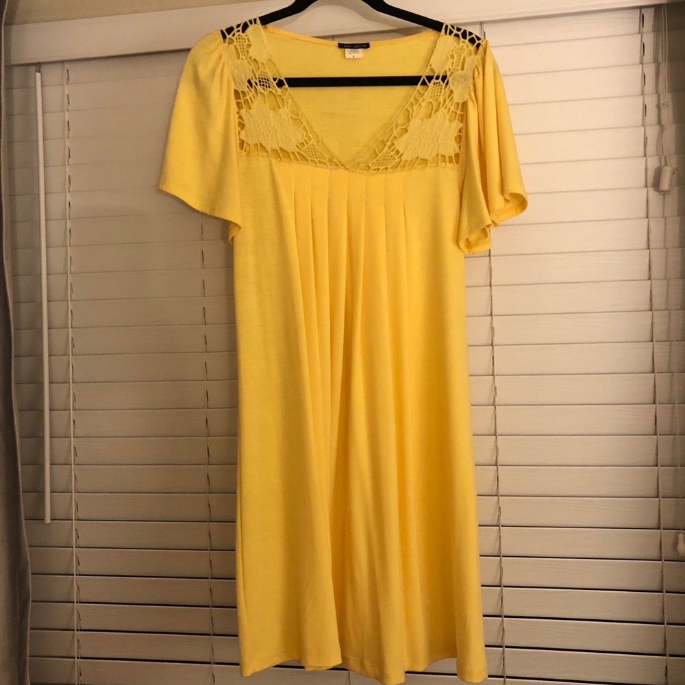 Knee length lace accented yellow dress